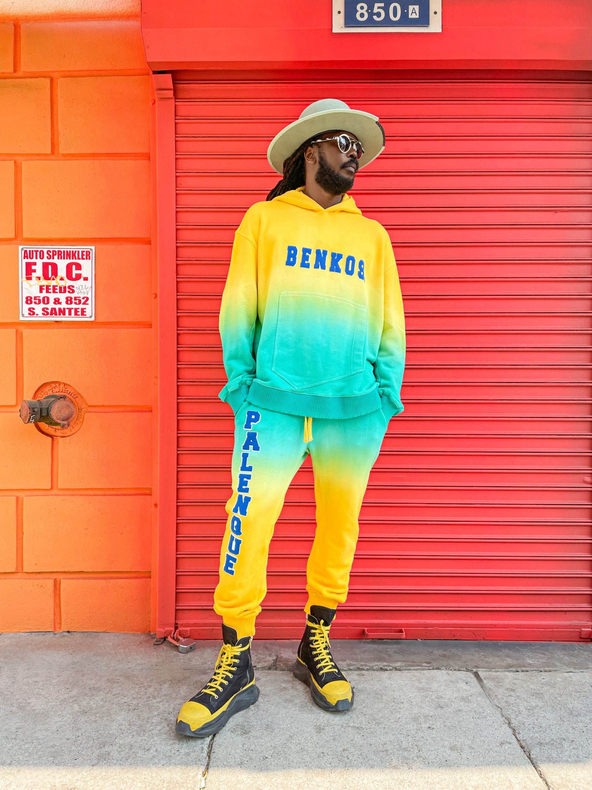 Palenque Hoodie – Lifestyle photo styled with matching joggers in a cultural setting