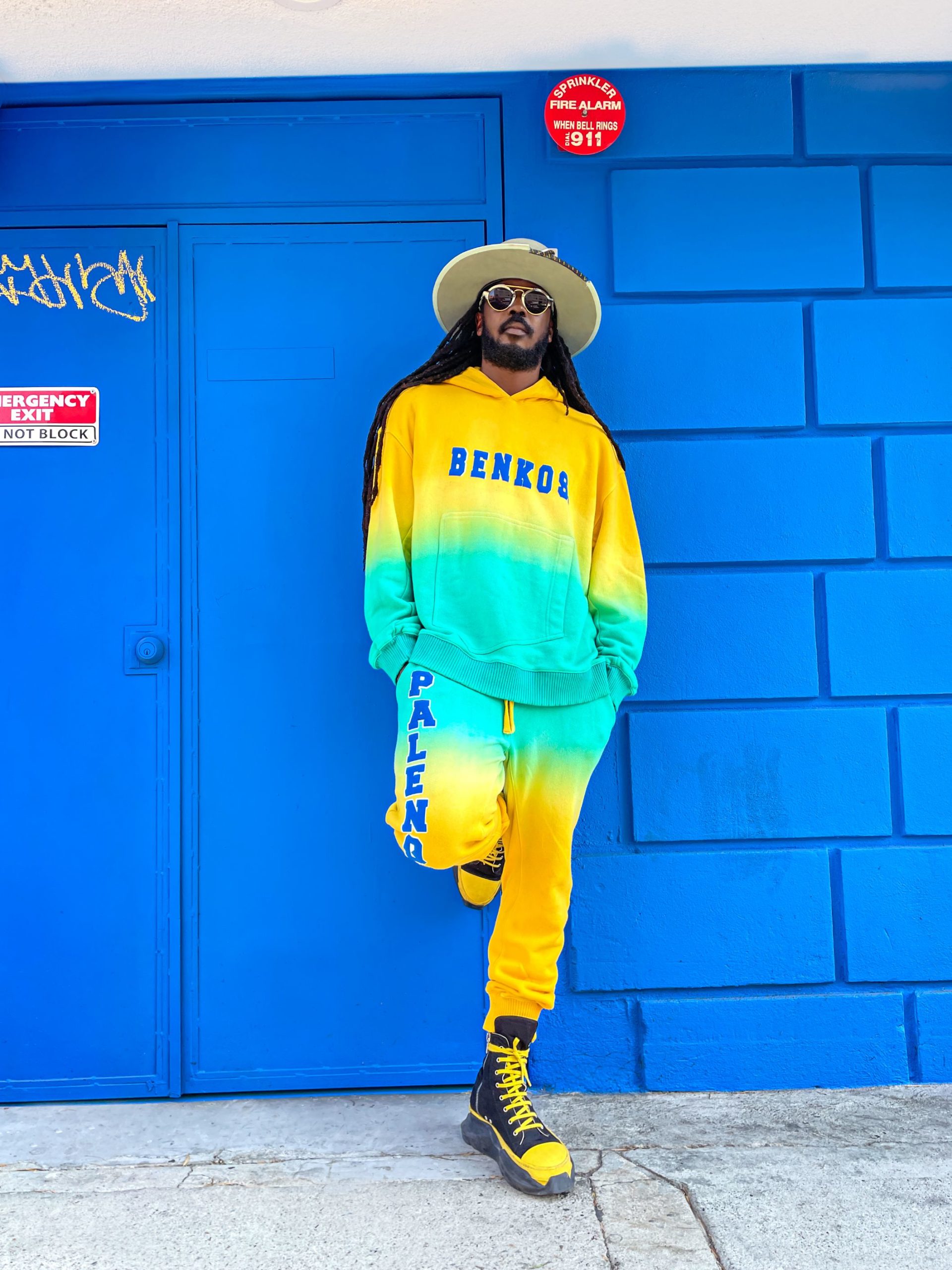 Palenque Hoodie – Lifestyle photo styled with matching joggers in a cultural setting